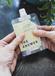 50 ML hand sanitiser product image 3 - A women holding 50ml travel pouch hand sanitiser